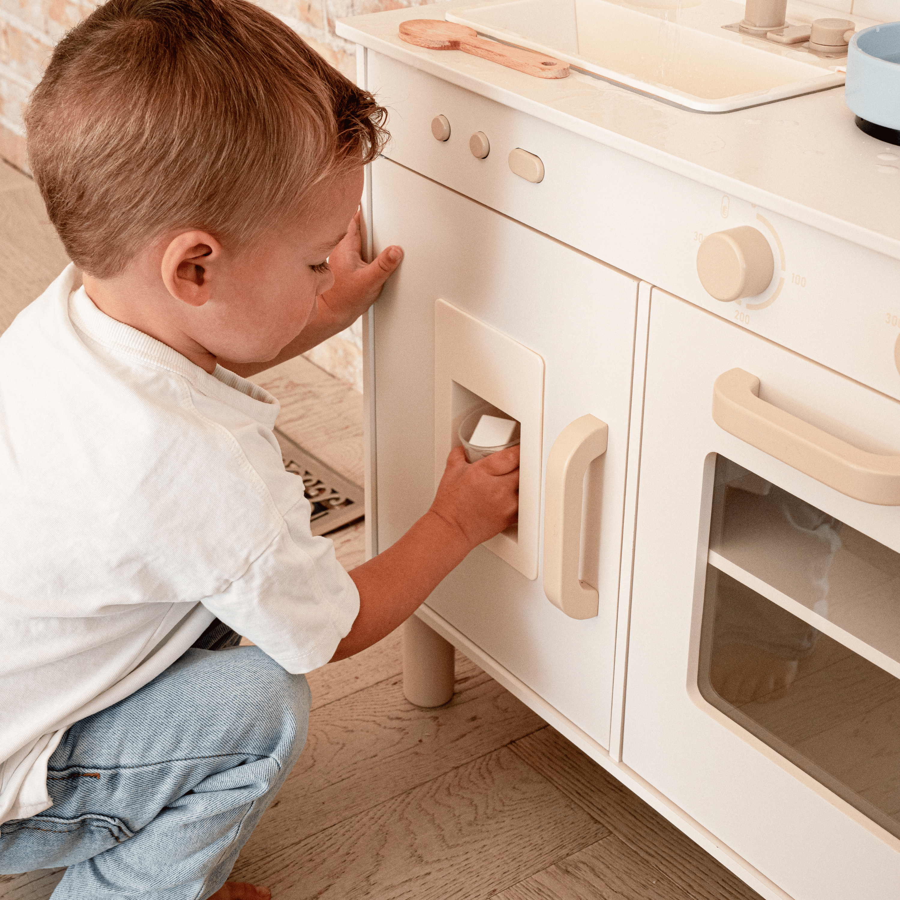 Play kitchen with ice maker and microwave detail